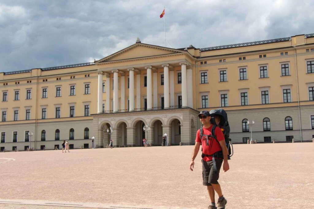 Dan Brewer, owner of FamilyCanTravel.com, wears shorts and a t-shirt on a warm sunny day in July in Oslo, Norway.