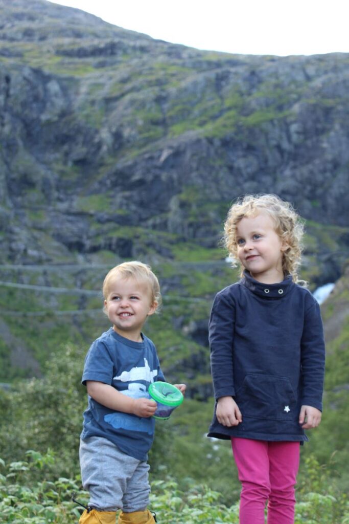 The Brewer kids, form FamilyCanTravel.com, are dressed for summer weather on a family road trip in Norway.