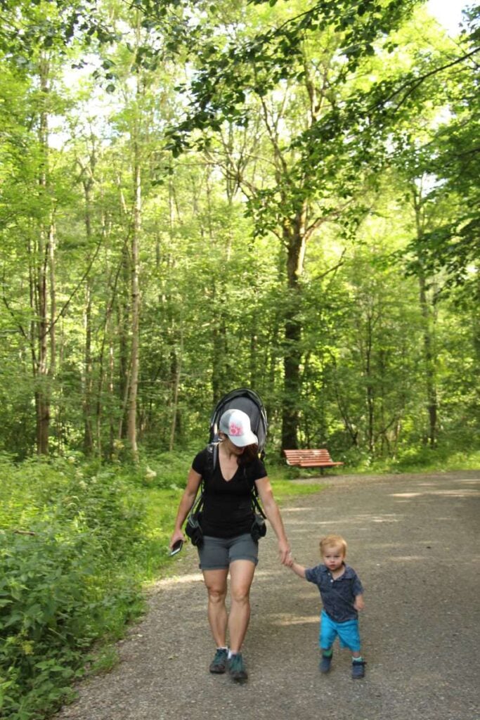 Celine Brewer and her son enjoy a family walk along the Akerselva River on the last day of their family-friendly Oslo itinerary.