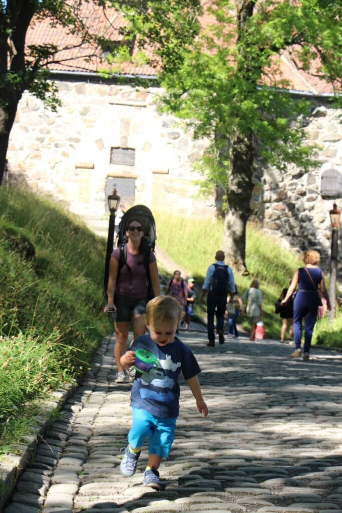 Celine Brewer and her son explore the Akershus Fortress while on a family trip to Oslo, Norway.