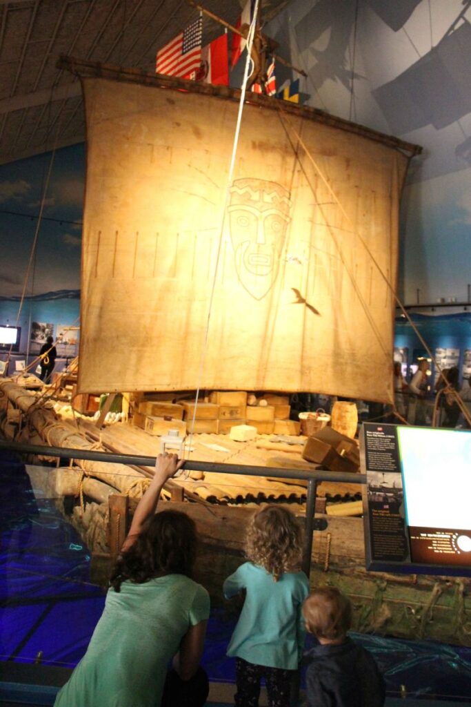Celine Brewer shows her kids the 'Moana boat' at the Kon Tiki Museum in Oslo, Norway.