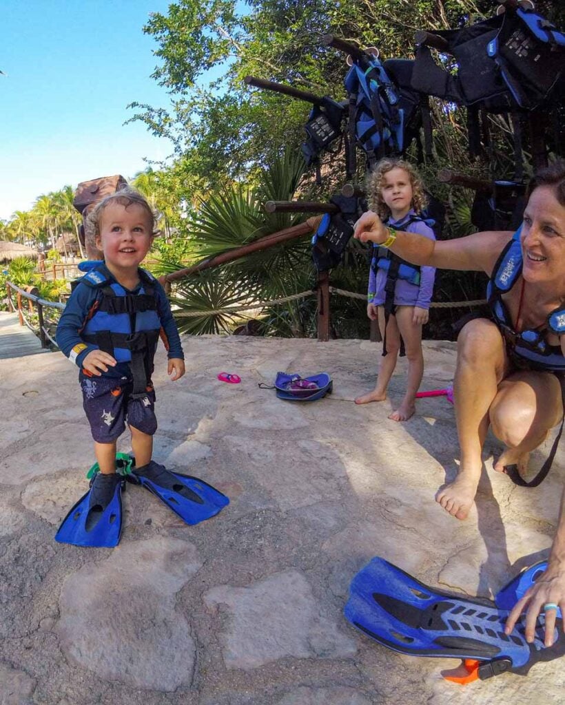 The Brewer family gets ready to try snorkeling at the Xel-Ha park during a family vacation to the Riviera Maya.