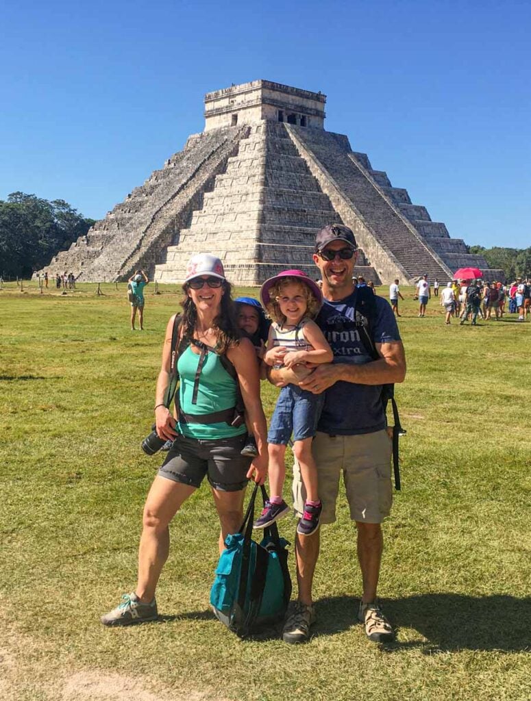 Dan and Celine Brewer, owners of FamilyCanTravel.com, visit Chichen Itza with their kids during a family vacation to Riviera Maya.