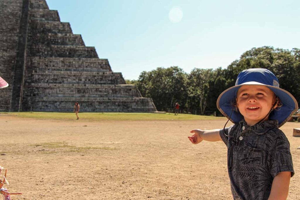 One of the Brewer kids, from FamilyCanTravel.com, visits Chichen Itza on a family trip to the Riviera Maya.
