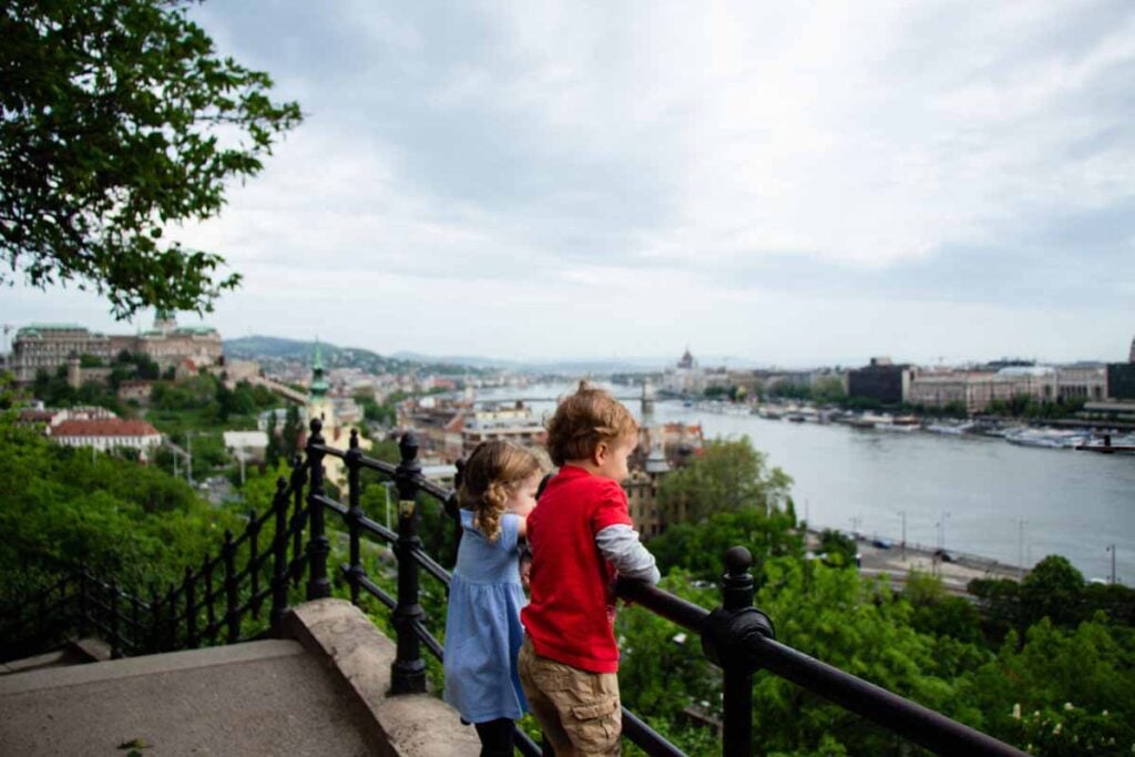 The Brewer kids enjoy the view from Gellert Hill while on a family trip to Budapest, Hungary.