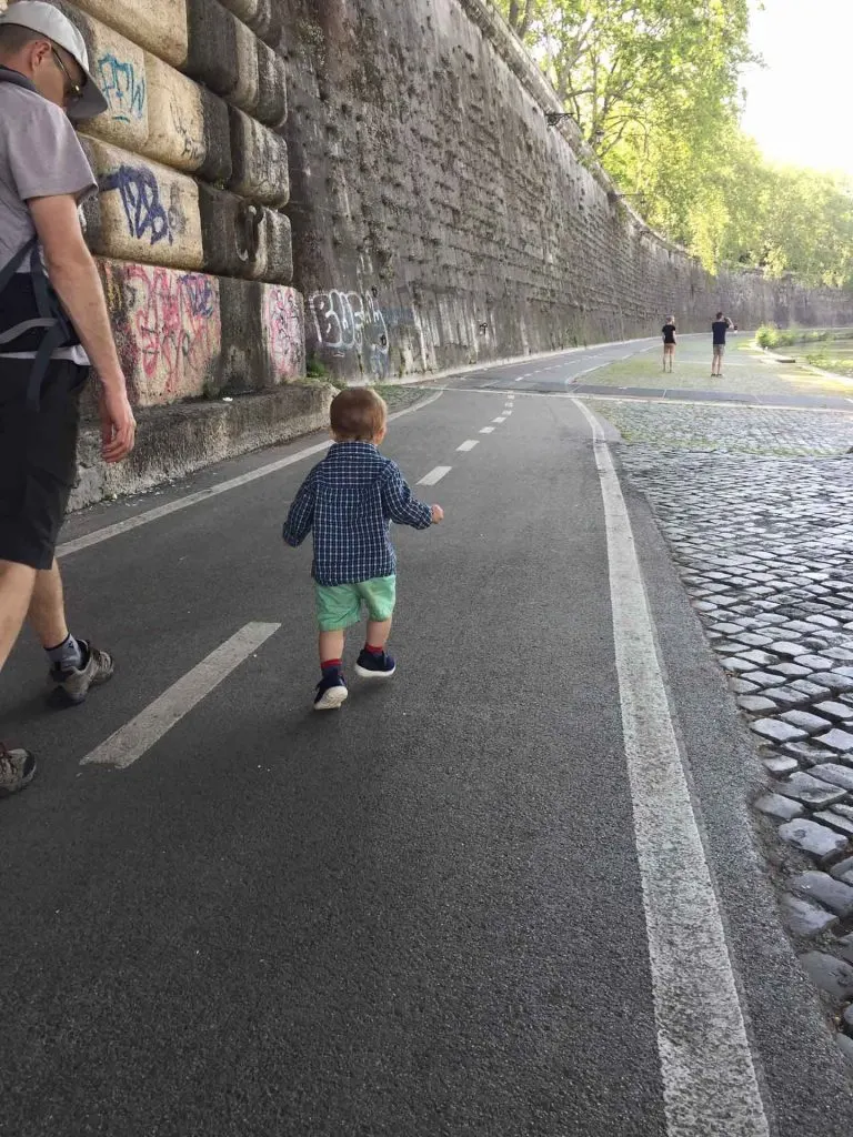 When traveling to Rome with kids, you'll need to find a place to let them blow off steam. Try a walk along the Tiber River Pathways