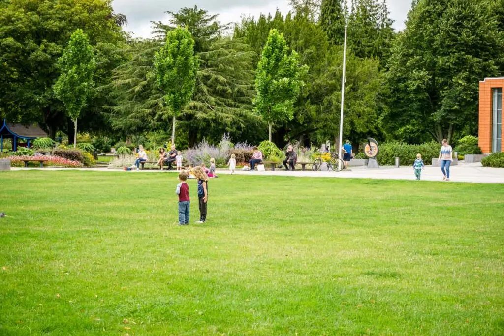 image of two kids playing on grass at Fitzgerald Park in Cork Ireland
