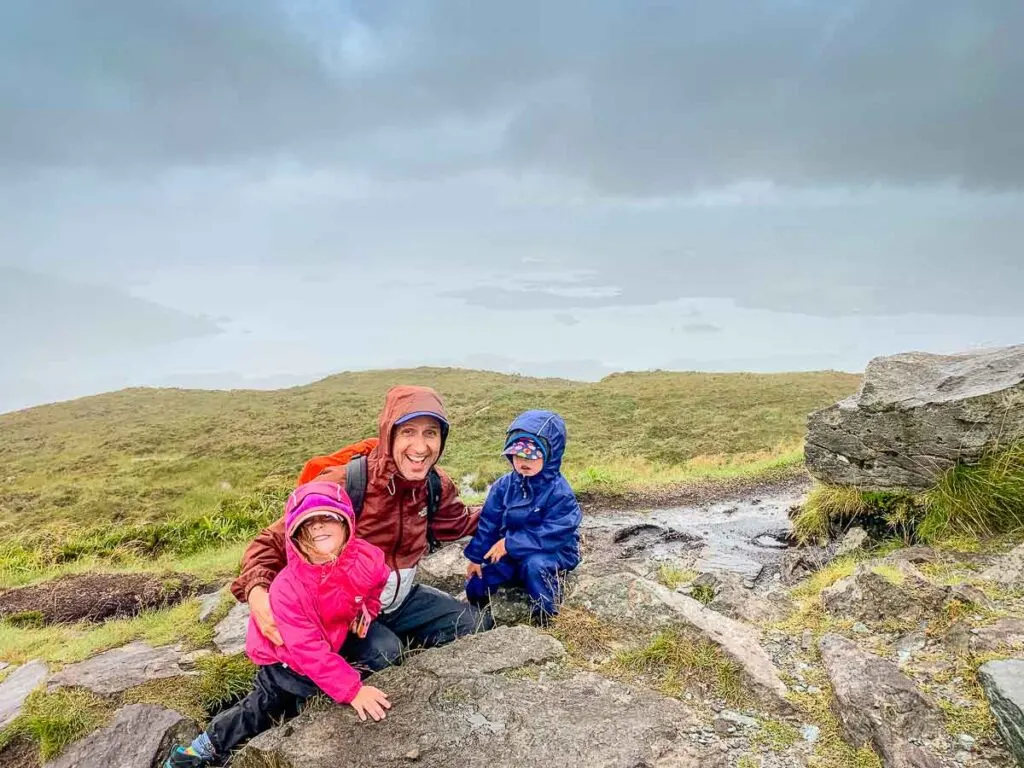 image of family at the summit of Torc Mountain in Killarney National Park in Ireland