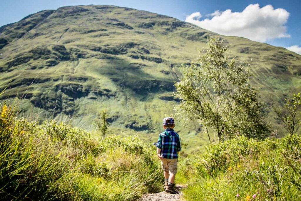 image of boy hiking in scotland