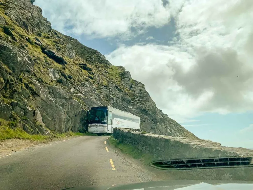 image of bus driving along narrow Slea Head Drive on Dingle Peninsula