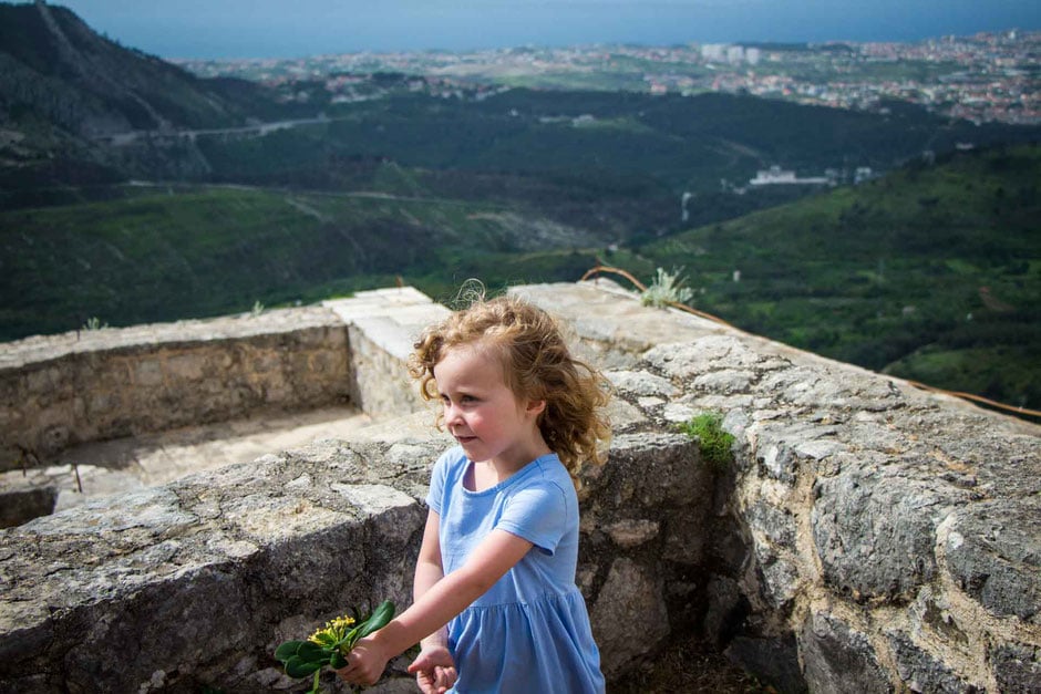 A girl enjoying a visit to the Klis Fortress in Split, Croatia.