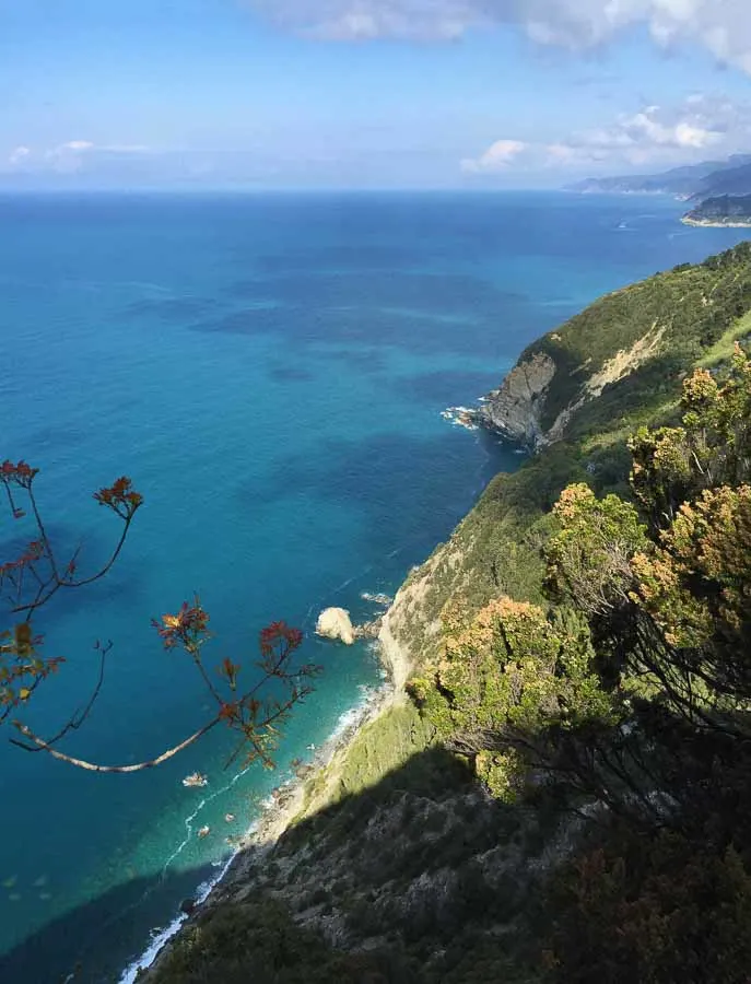 The beautiful blue waters of the Ligurian Sea as seen from the Monterosso to Levano trail in Cinque Terre, Italy