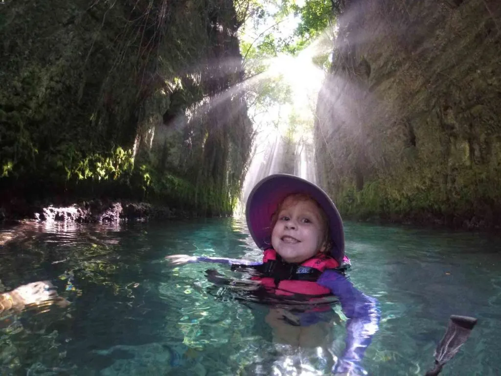 Swimming the underground river at Xcaret with kids