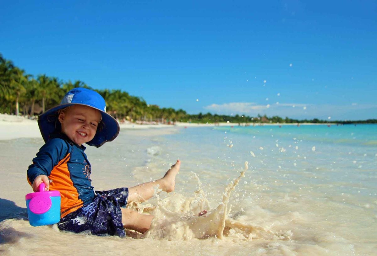 Small waves make Xpu-ha a very toddler-friendly beach near Playa del Carmen