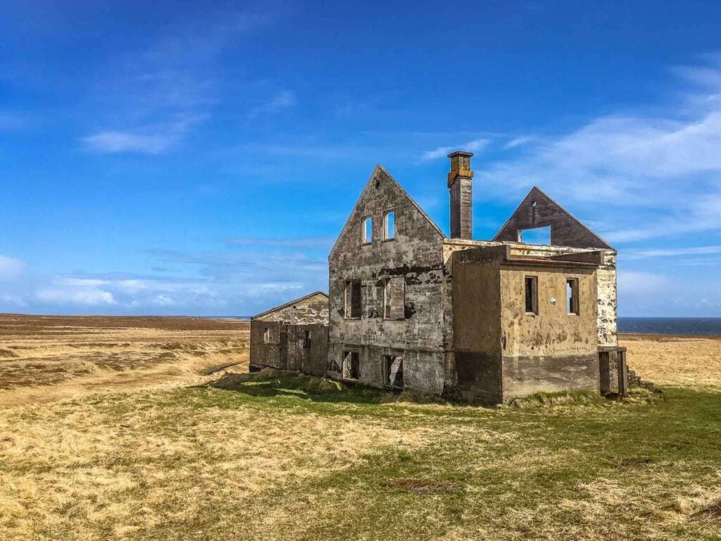 an abandoned farmhouse near Snaefellsjoekull National Park on Snaefellsnes Peninsula Iceland with kids