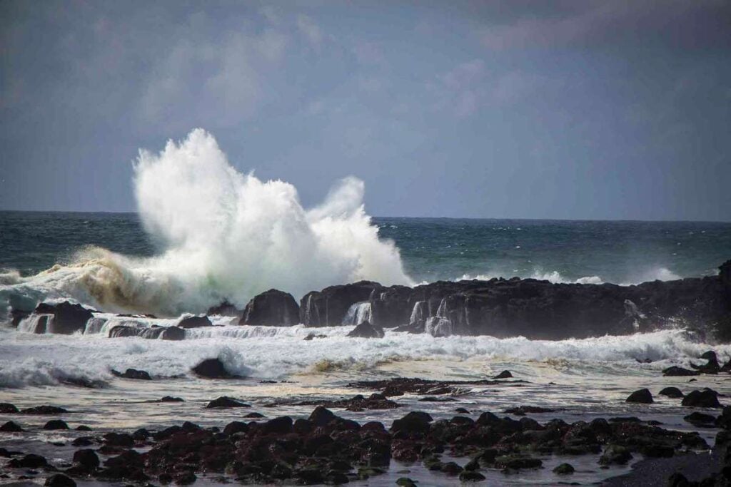 things to do on the Snaefellsnes Peninsula with kids - watch waves crash at Londrangar Cliffs near Malariff Lighthouse