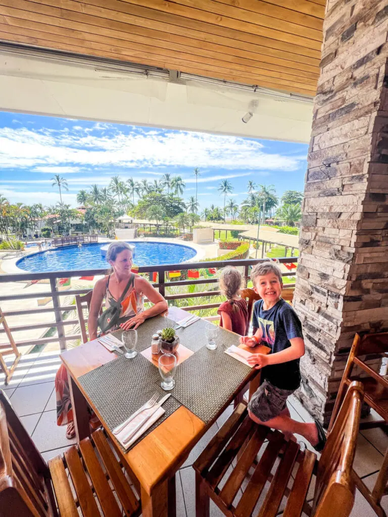 a family is excited for lunch at the all-you-can-eat buffet at the all-inclusive Best Western resort in Jaco Beach, Costa Rica
