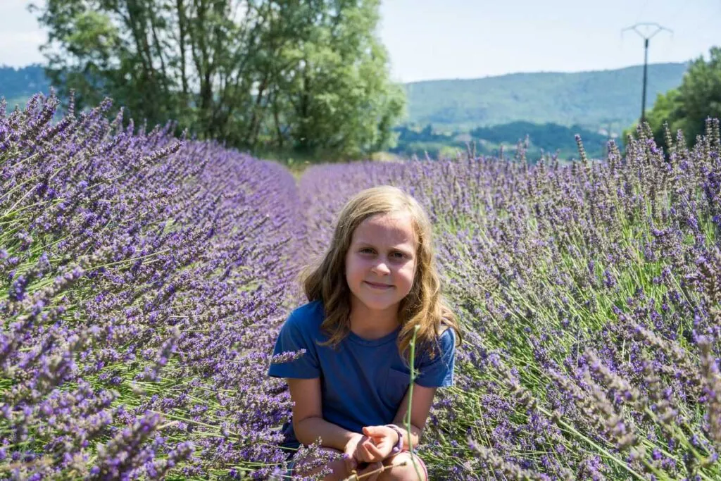 a 9-year old girl on a family vacation to France visits the Lavender fields in Provence