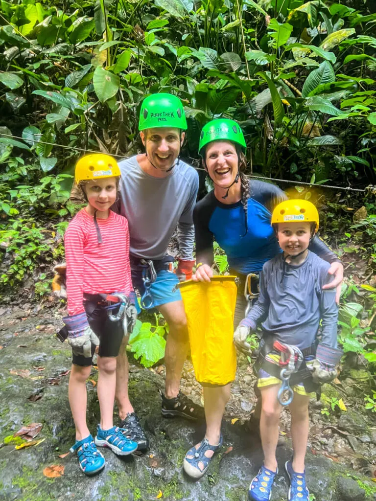 a family enjoying a kid-friendly rappelling tour in La Fortuna, Costa Rica