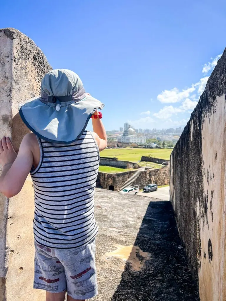 A boy loves exploring the historic forts in San Juan, Puerto Rico.