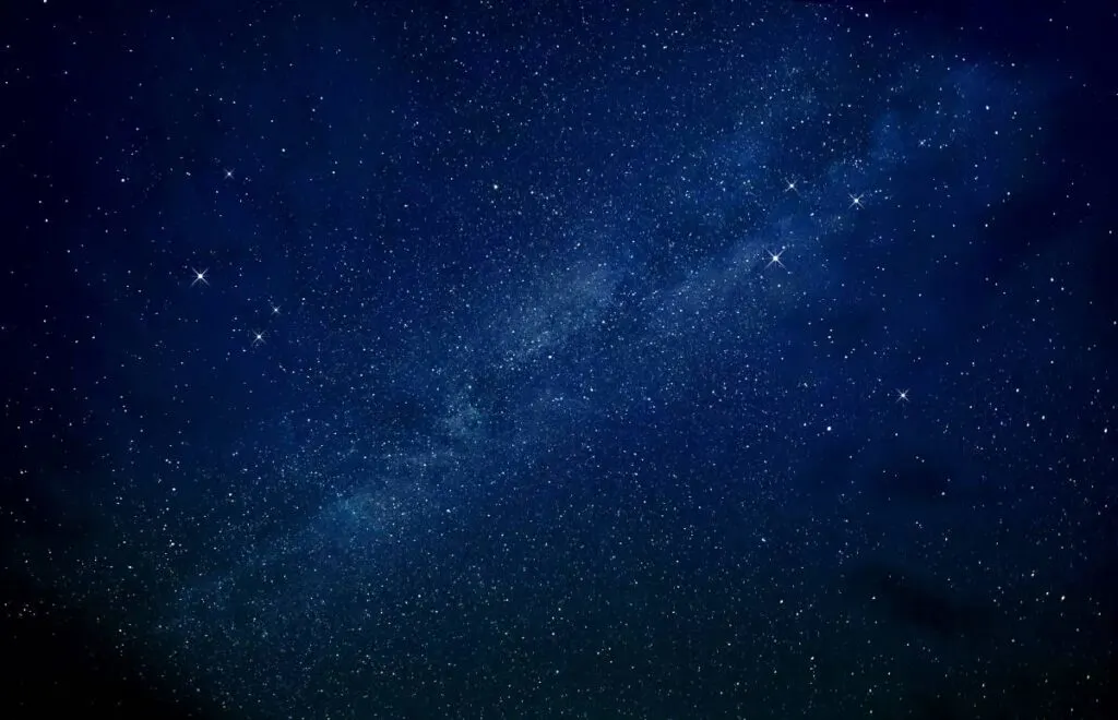 a dark sky full of stars.
