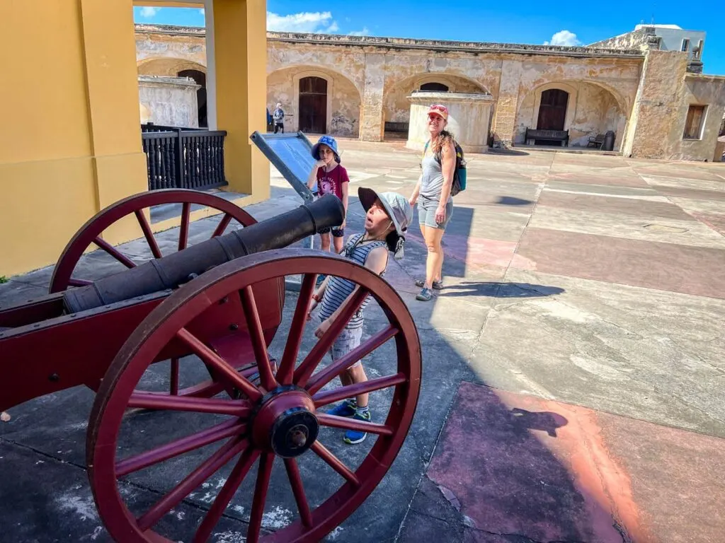 A family visiting world heritage fort during a one day visit to San Juan, Puerto Rico.