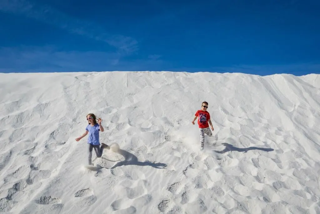 A visit to White Sands National Park with kids is a super fun family vacation.