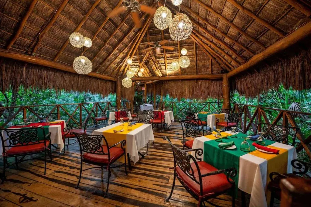 an open air restaurant at the Viva Wyndham Maya all-inclusive resort for families.