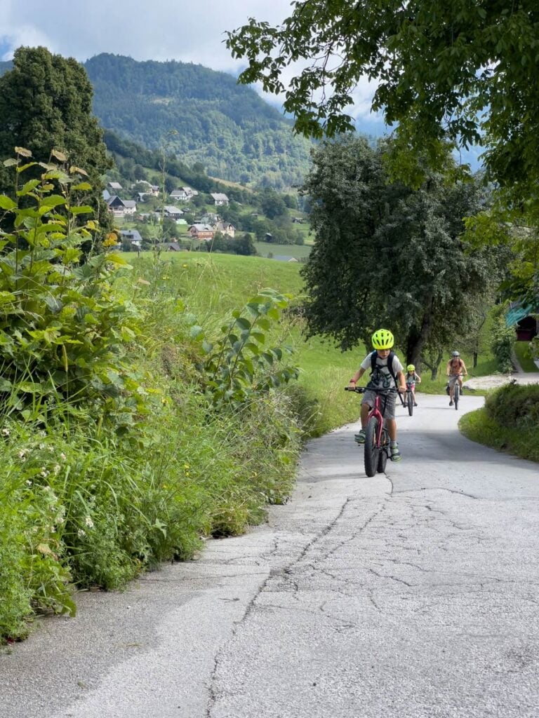 a family cycles in the hills outside Bled, Slovenia.
