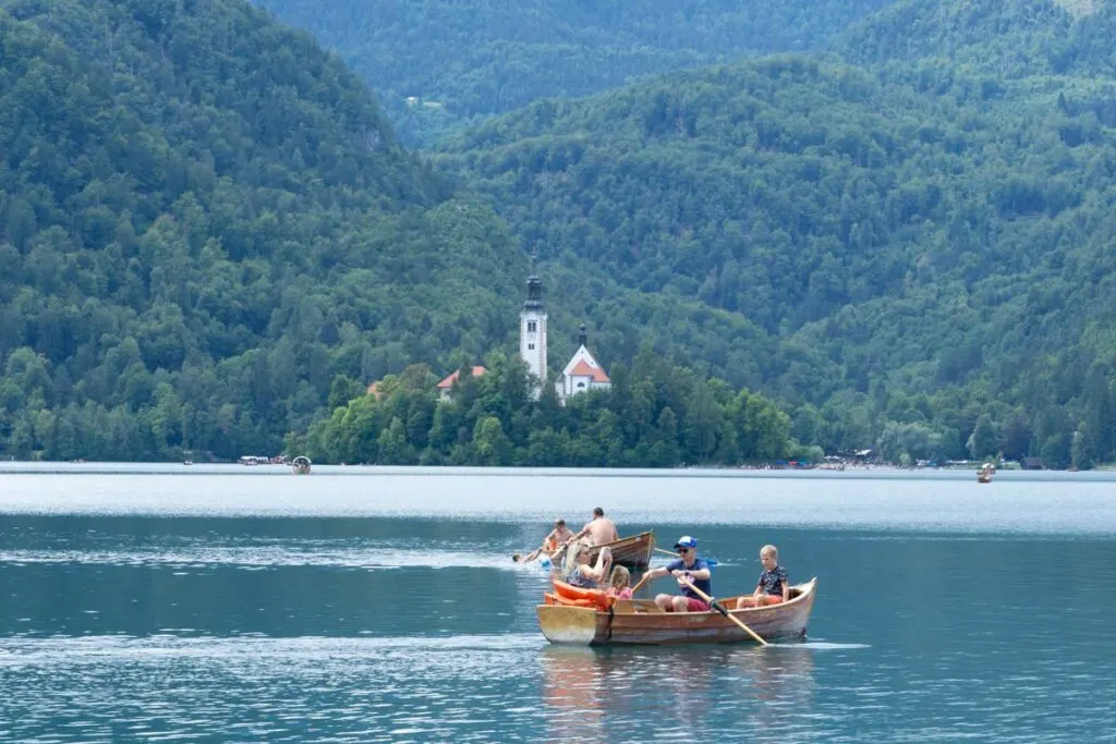 boaters on the water on Lake Bled, Slovenia.