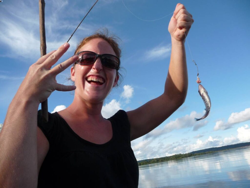 Celine Brewer - from the FamilyCanTravel.com family travel blog - goes piranha fishing in Brazil.