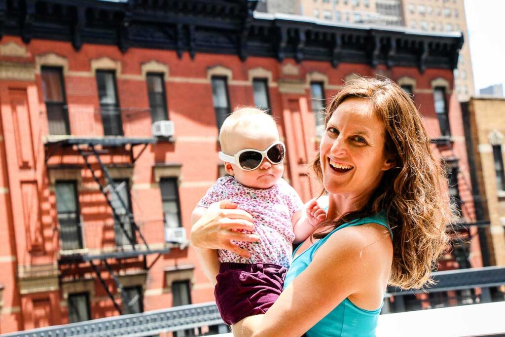 Travel blogger Celine Brewer, from Family Can Travel, enjoys a family trip to NYC with her baby daughter.
