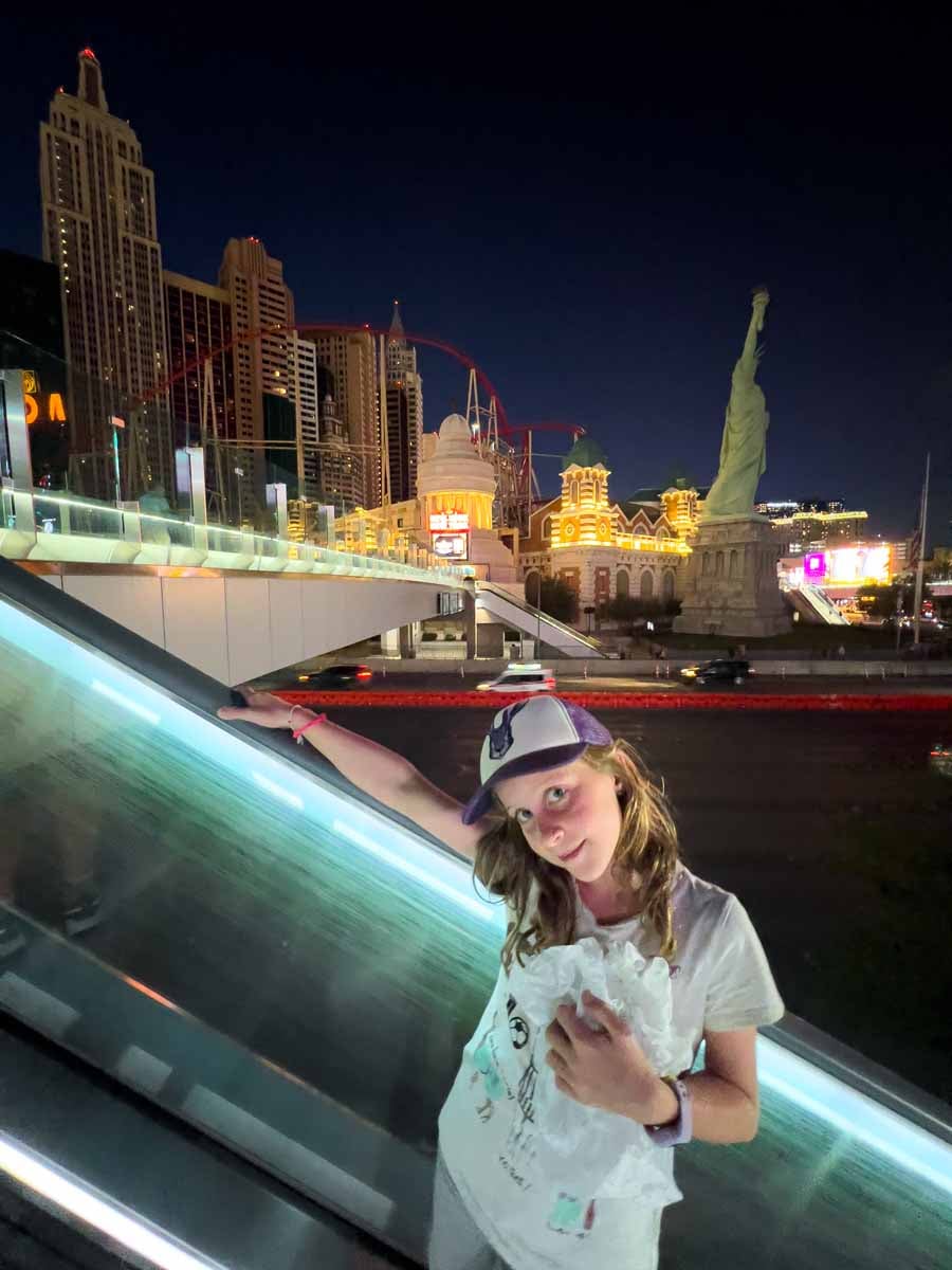 a 10-year old girl enjoys a walk on The Strip on a 3-day family vacation to Las Vegas, Nevada.