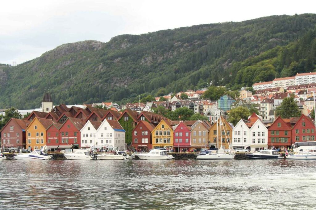 a view of the colorful Bryggen buildings from a Bergen fjord tour.