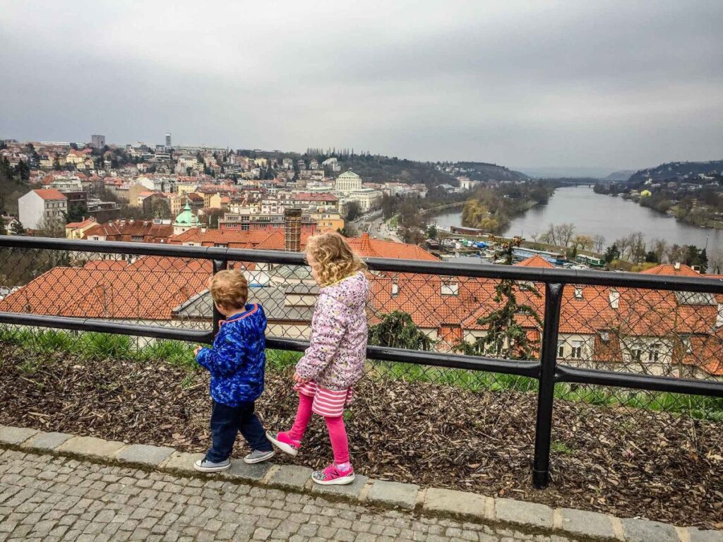 The Brewer kids, from FamilyCanTravel.com, enjoy a family walk in Prague near Vysehrad Fortress.