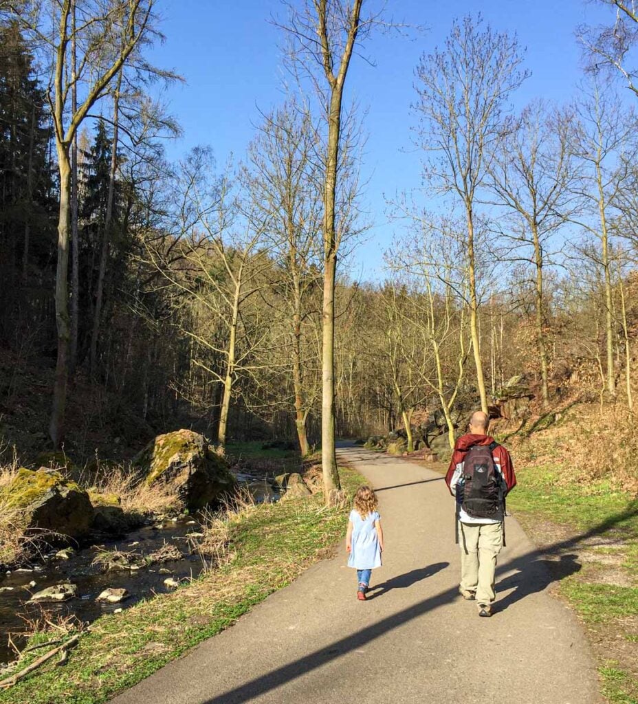 Dan Brewer, owner of FamilyCanTravel.com, enjoys an easy walk in Divoka Sarka during a family trip to Prague.