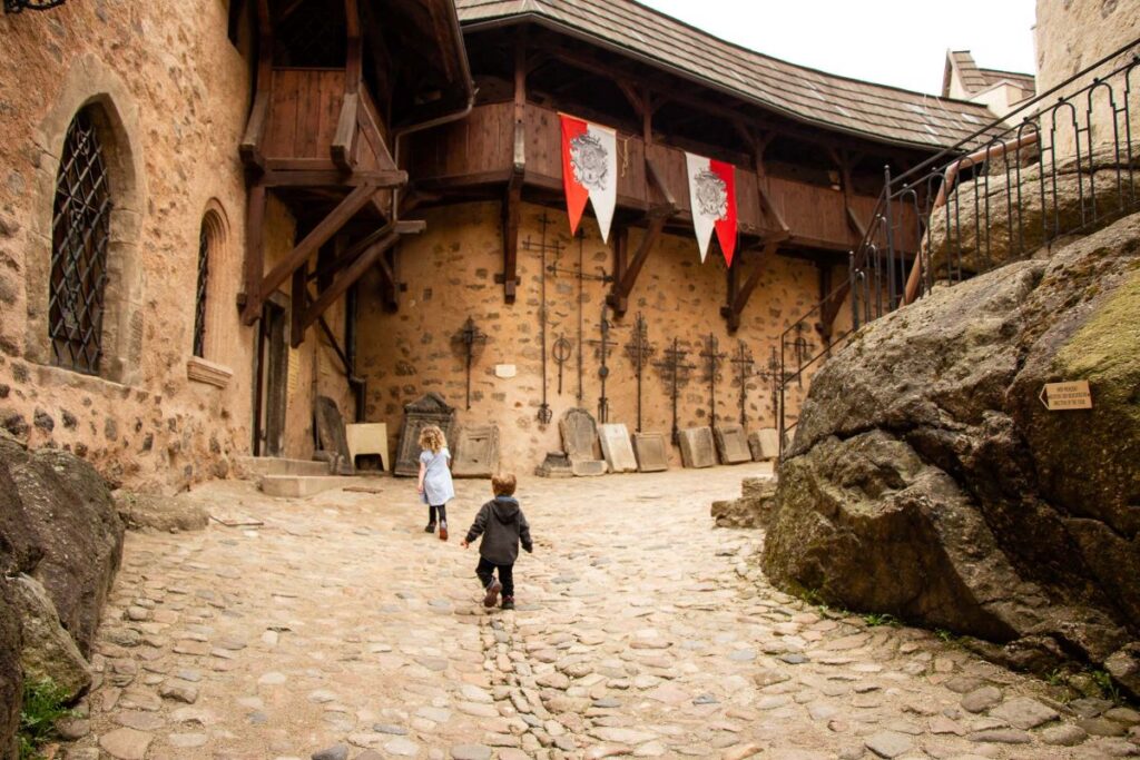 The Brewer kids, from the FamilyCanTravel.com blog, are excited to visit the Loket Castle after hiking from Karlovy Vary,