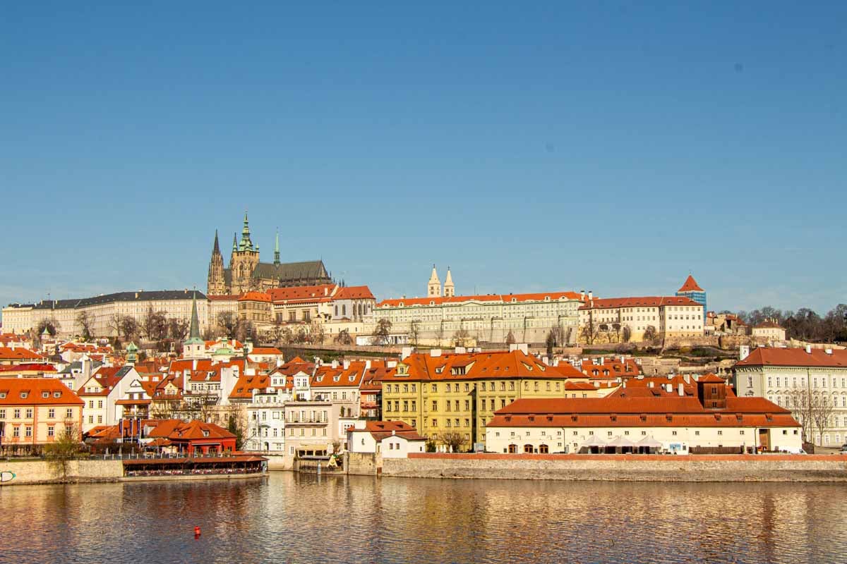 a beautiful view of Prague across the river.