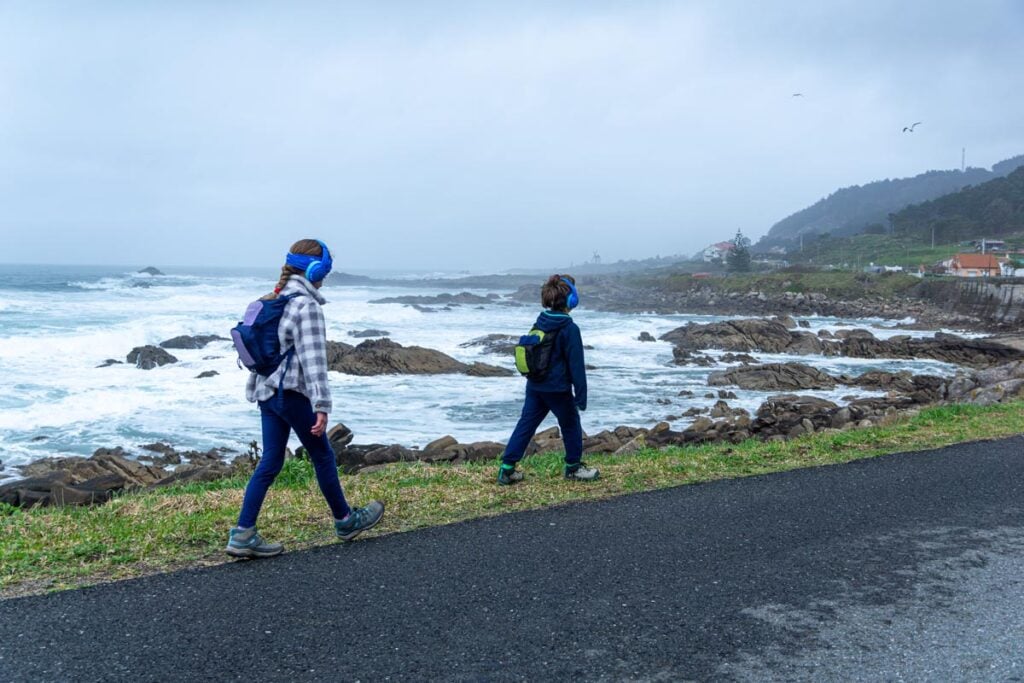 The Brewer kids walk along the Atlantic Ocean on the first stage of their family tour along the Portuguese Coastal Camino Route.