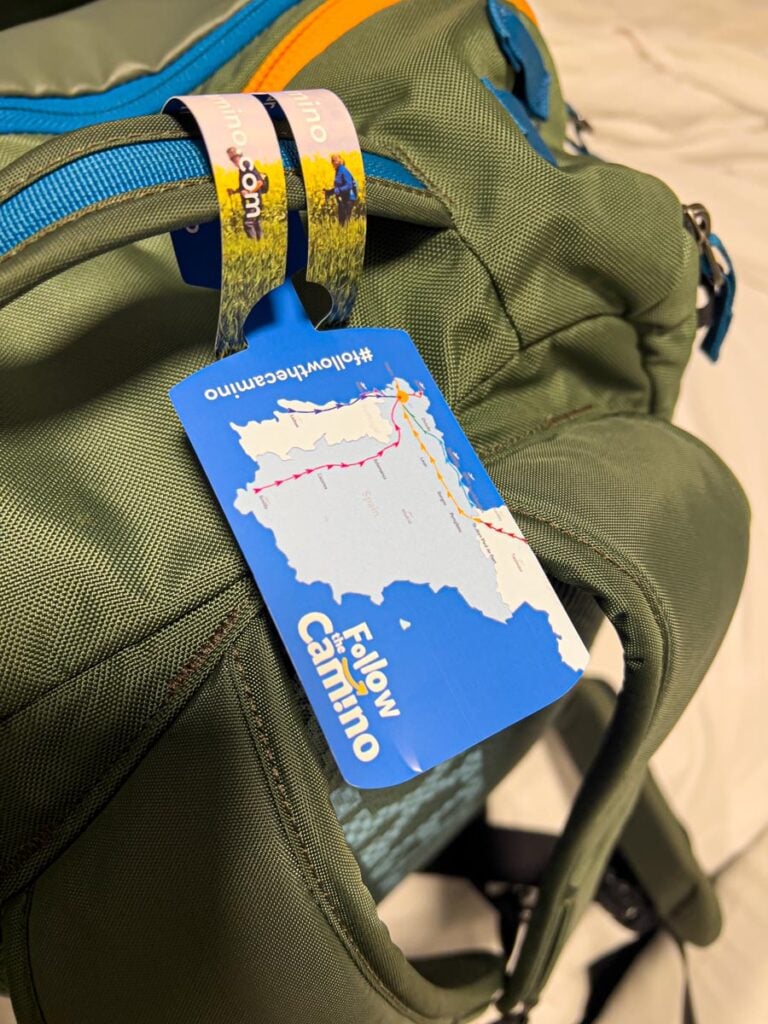 A Follow the Camino luggage tag on our suitcase ensures that it will be transferred to our next hotel along our self-guided Camino tour.