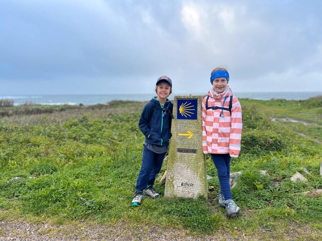 The Brewer kids pose for a picture at the starting point of their family-friendly Camino tour on the Portuguese Coastal Route.