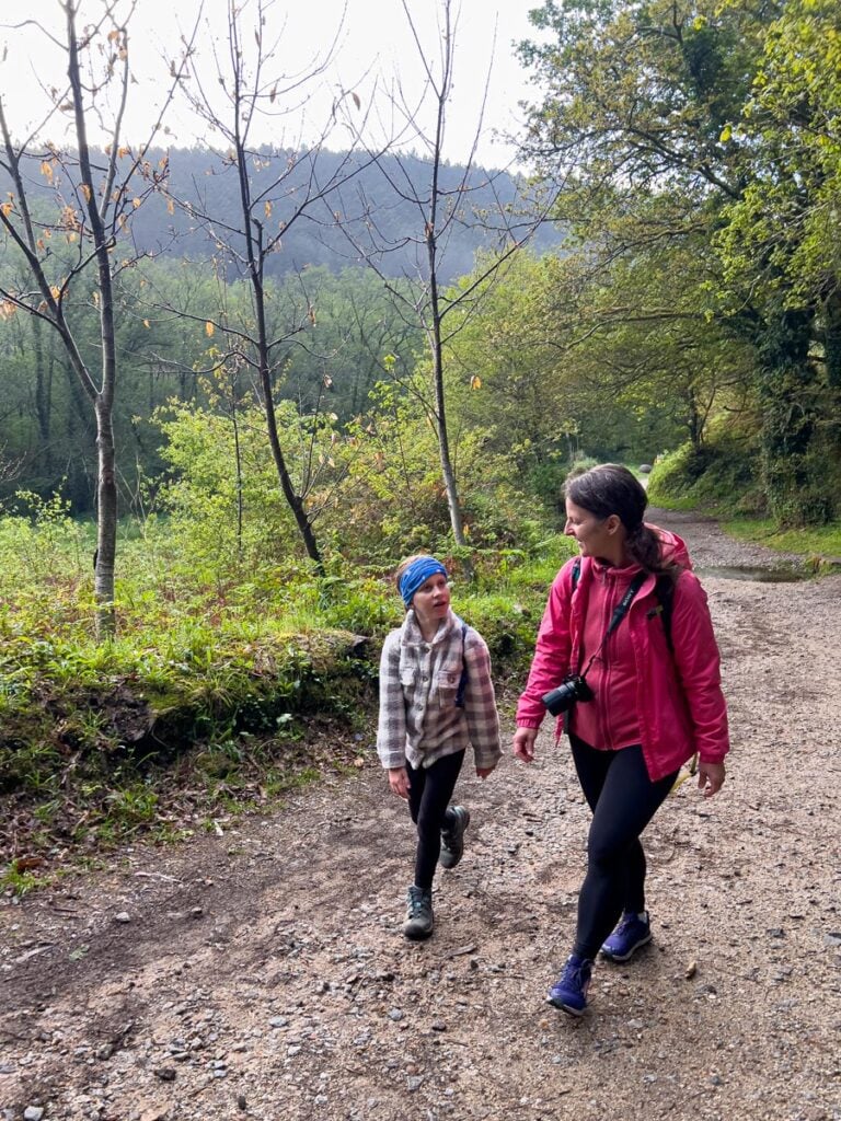 Celine Brewer, owner of FamilyCanTravel.com, enjoys a conversation with her 10-year old daughter along the fifth stage of the Portuguese Coastal Camino Route.