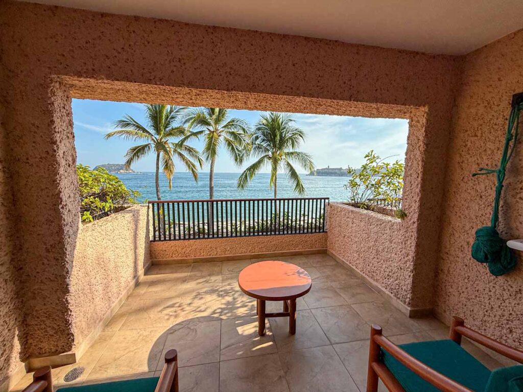 A large balcony in a Barcelo Huatulco - Deluxe Sea Front View Premium Level Room at the Barcelo Huatulco all-inclusive resort.