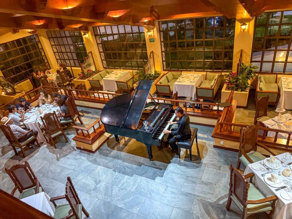 A grand piano inside the La Fontana Restaurant at the Barcelo Huatulco all-inclusive resort.