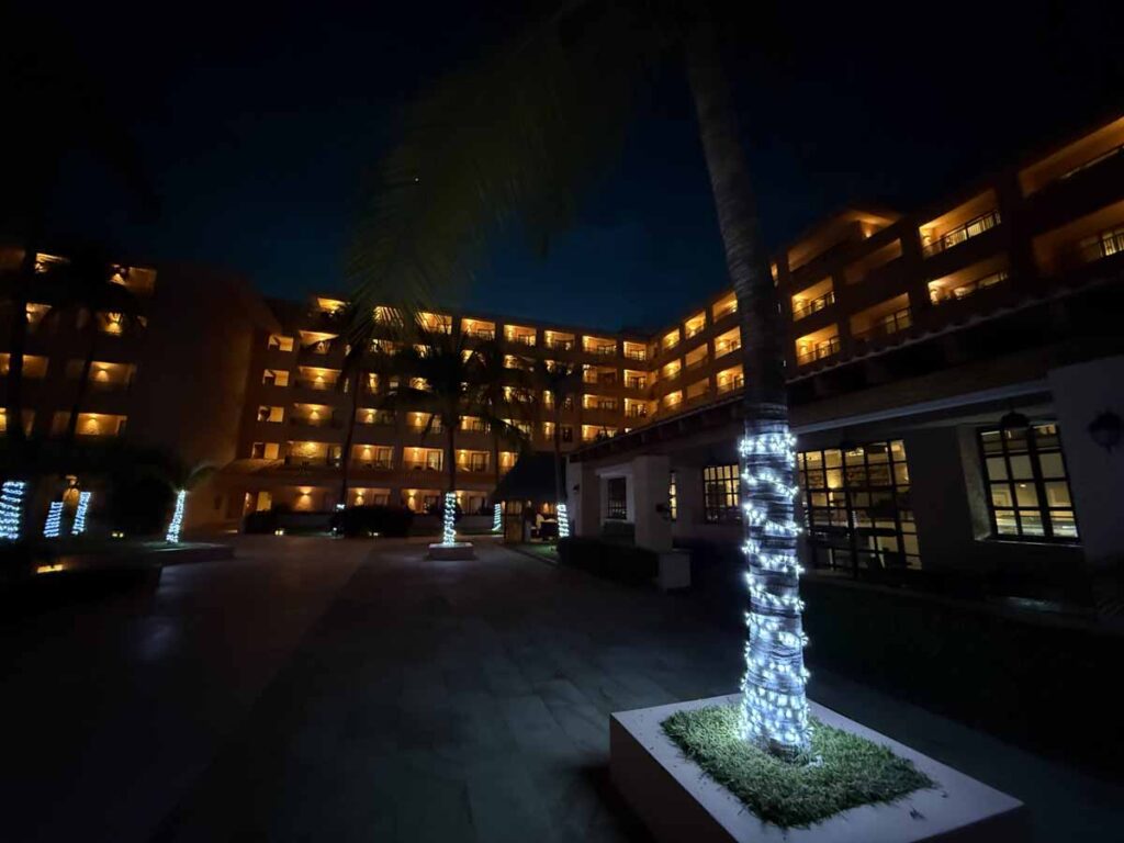 The Barcelo Huatulco all-inclusive resort is nicely lit up at night.