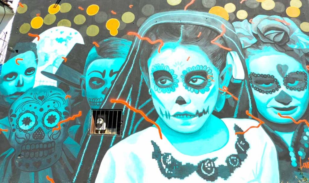 a colorful mural on a wall in Jalatlaco, Oaxaca, Mexico.