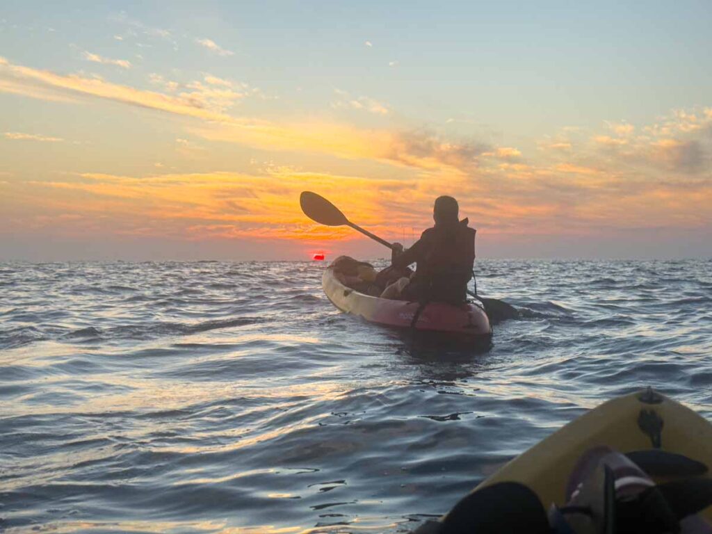 The Brewer family, from the FamilyCanTravel.com blog, enjoys a sunrise kayaking tour in Huatulco, Mexico.