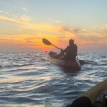 things to do in Huatulco with kids - sunrise kayak tour The Brewer family, from the FamilyCanTravel.com blog, enjoys a sunrise kayaking tour in Huatulco, Mexico.