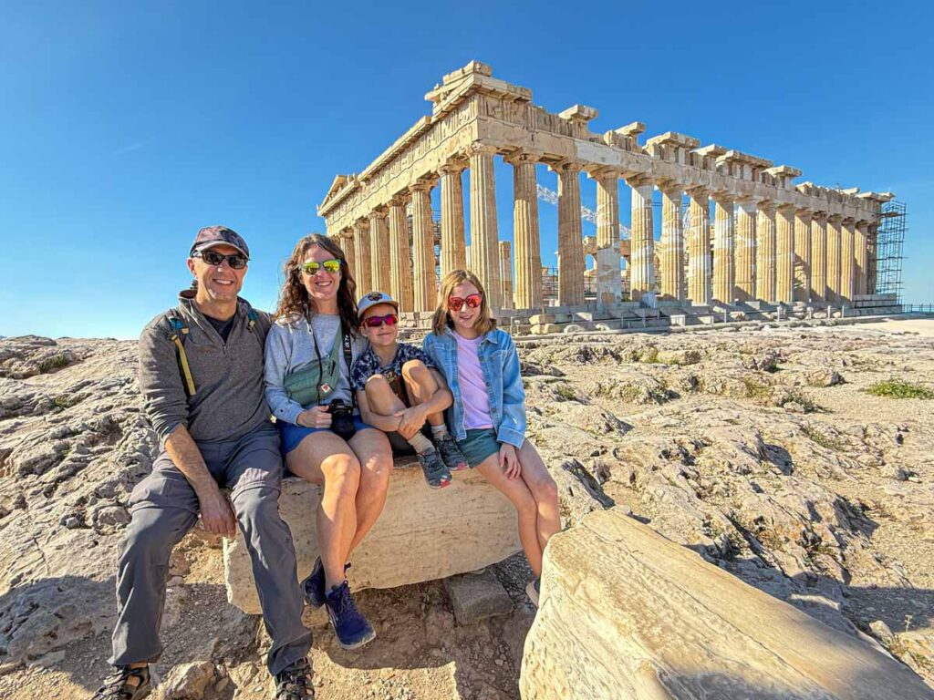 The Brewer family, from the FamilyCanTravel.com blog, visits the Parthenon on a recent family trip to Athens, Greece.