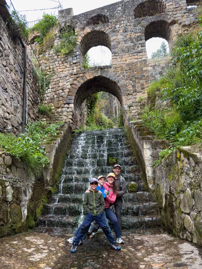 Dan and Celine Brewer, owners of FamilyCanTravel.com, visit the Sapantiana Aqueduct during a 3-day stay in Cusco on a family trip to Peru.